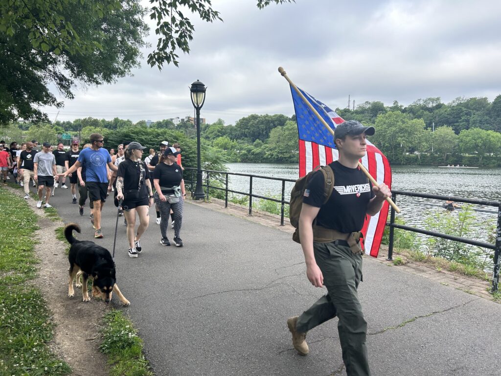Power employee lead the ruck march along Kelly Drive and Boat House Row