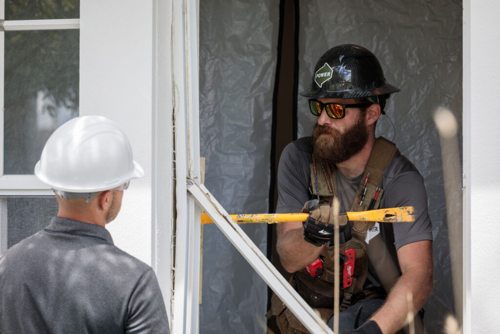 Remodeling contractor working on a window replacement 