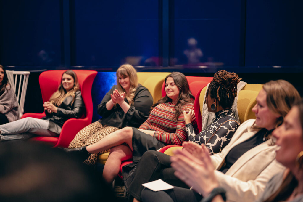 Members of the Power Women's Initiative take part in a workshop at the company's Women's History event. 