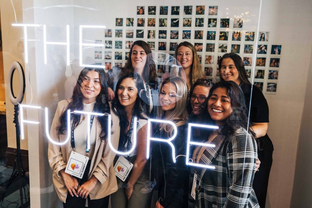 Members of PWI gather at one of POWER’s past Women’s Summits — a conference dedicated to advancing the initiative and connecting women from all different offices and departments across the business.