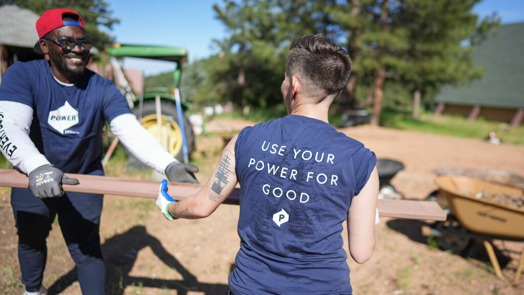 Two POWER employees donating their time for the benefit of the larger community.