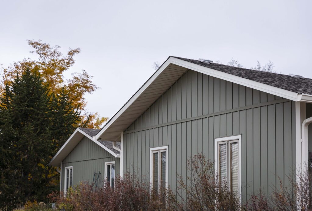 Siding on a home during the fall season.