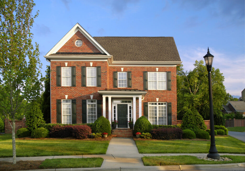 A home with brick veneer is one of the popular siding options available to homeowners. 